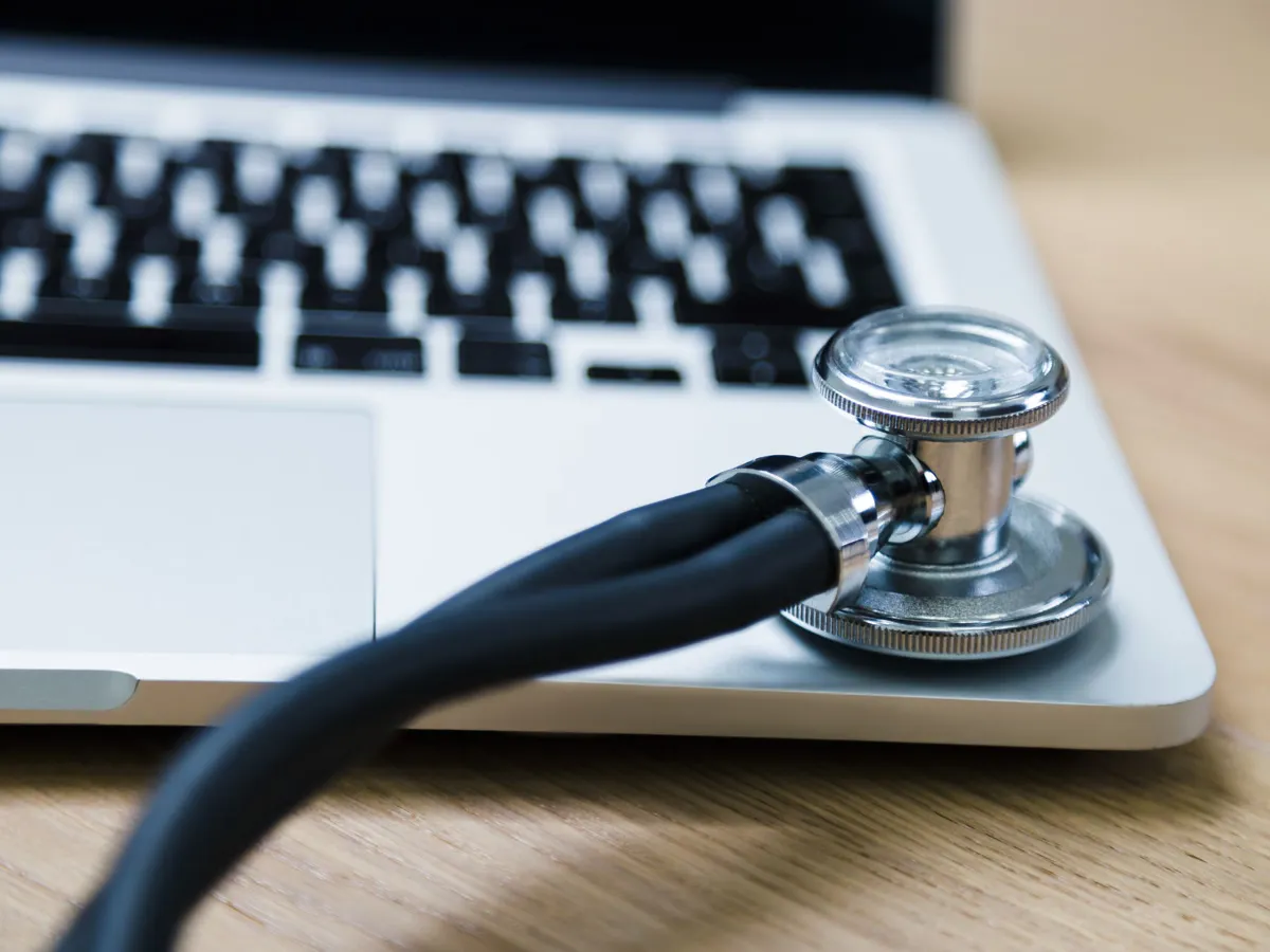 A stethoscope on a laptop keyboard